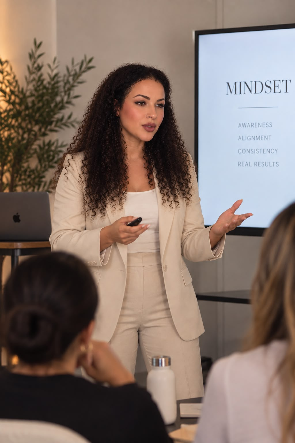 Linda leading a mindset workshop in front of a small group